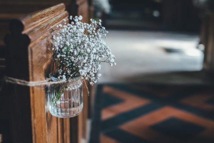 Pretty Flowers On A Pew